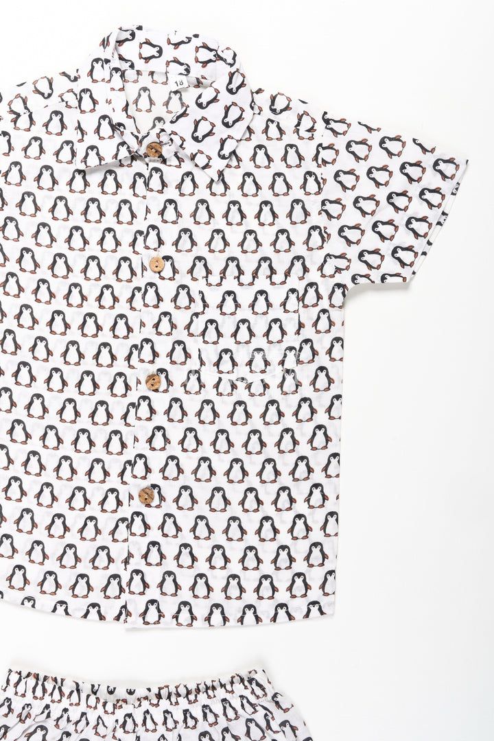 1762415561950-nesavu-boys-smart-and-casual-wear-set-with-penguin-print-shirt-and-matching-shorts-in-cool-cotton-fabric-boys-casual-set-thenesavu-nesavu-boys-smart-casual-wear-cotton-set-all-over-penguin-print-shirt-shorts-1174712740 (1).jpg